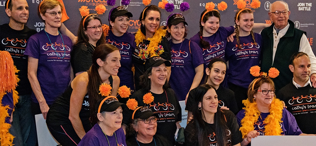 Cathy Fabiiti, surrounded by friends and family after participating in Cycle for Survival